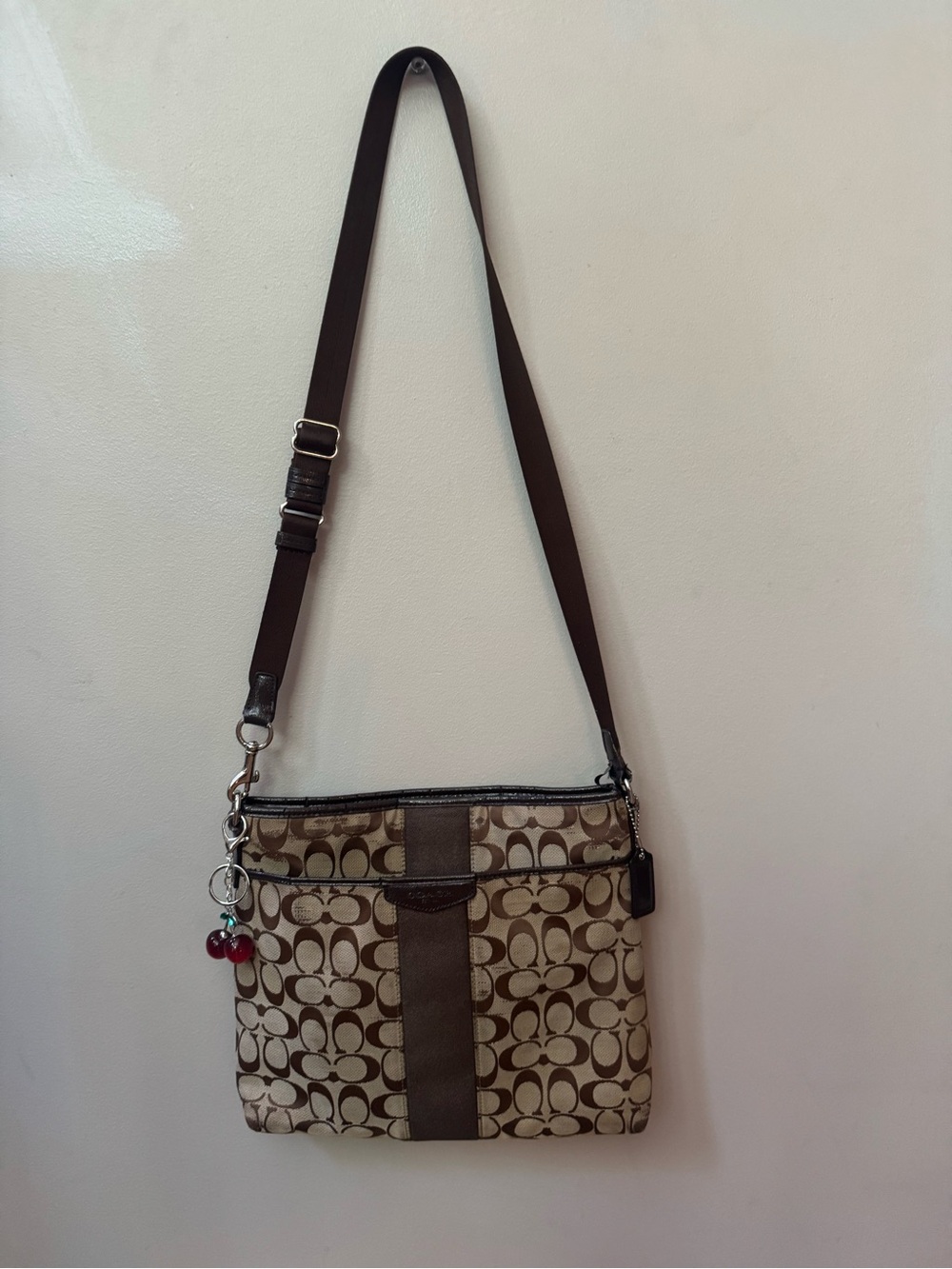 Coach Brown Signature Canvas Crossbody with Cherry Charm